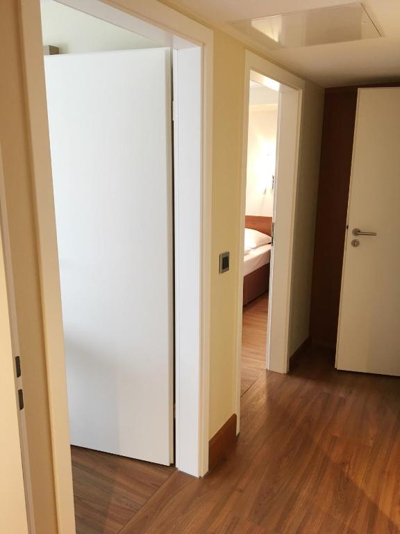 Postel nebo postele na pokoji v ubytování Dürer-Hotel