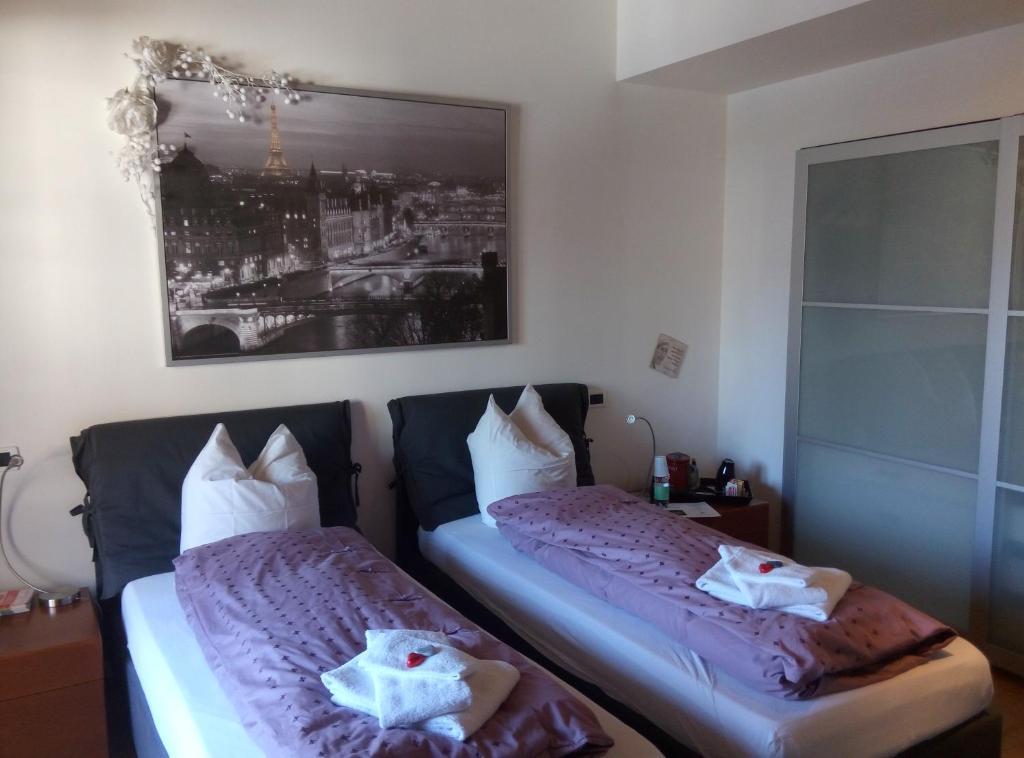 Postel nebo postele na pokoji v ubytování B&B AI PELLEGRINI