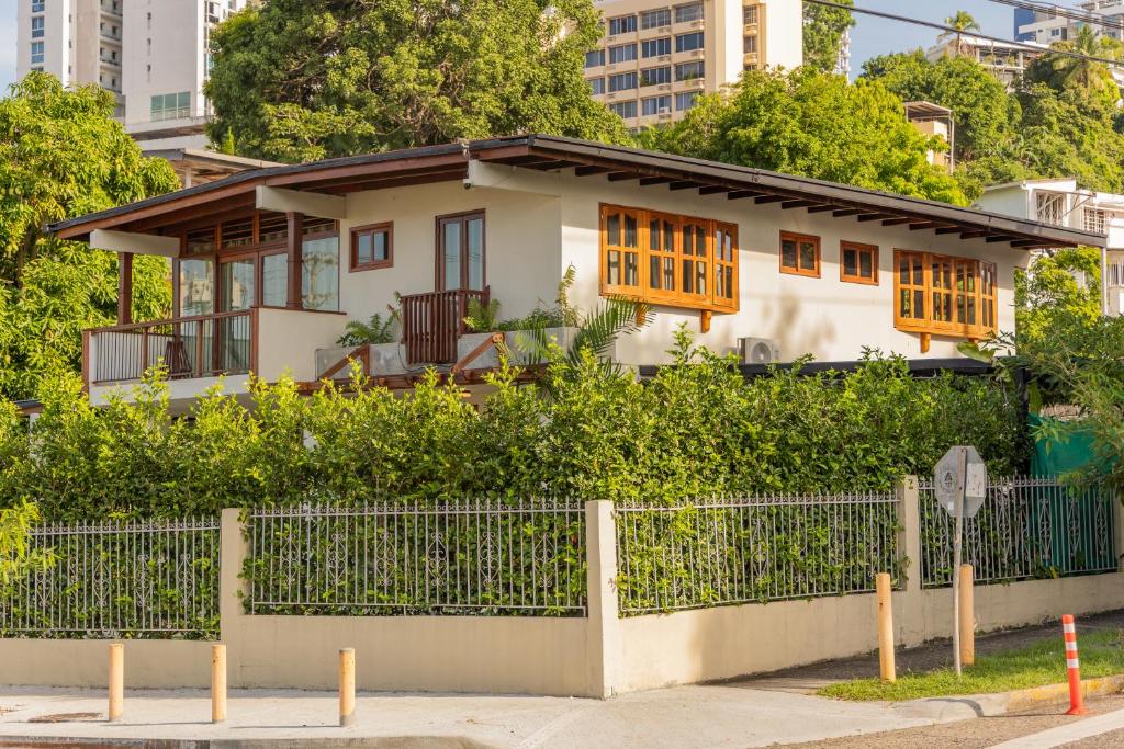 a house with a fence in front of it at Casa Úrsula in Panama City