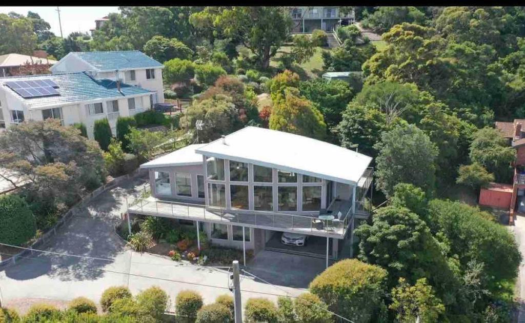 an aerial view of a large white house at Marcail Views Lakes Entrance in Lakes Entrance