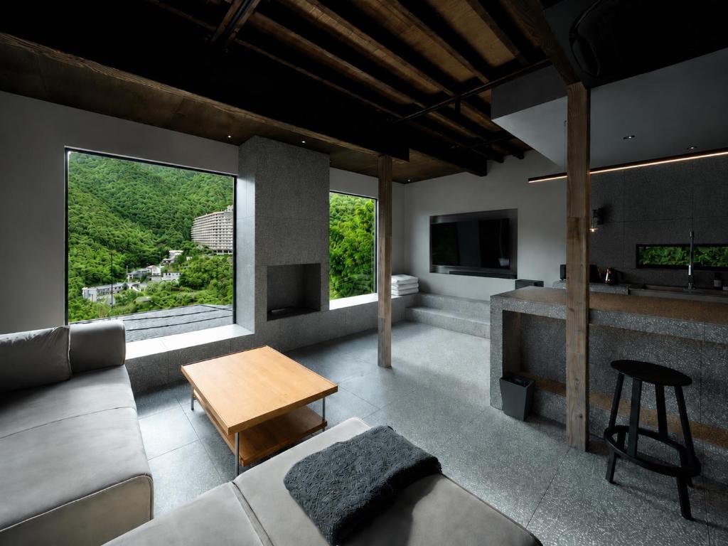a living room with a couch and a table at N3 ATAMI-Forest- in Atami