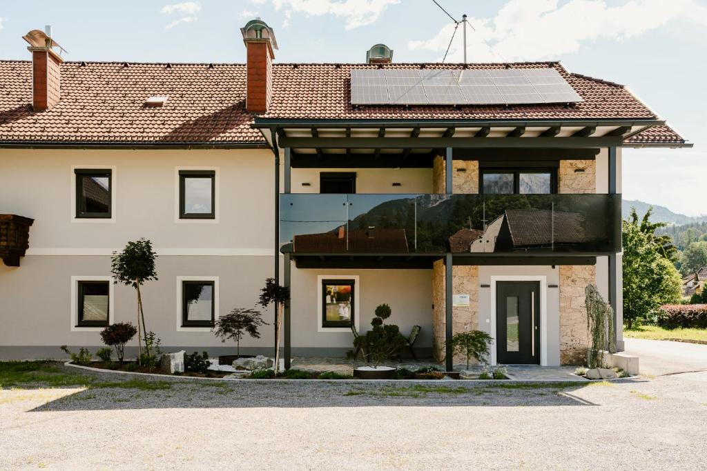 a house with a solar array on the roof at Peak9 Apartment in Greifenburg
