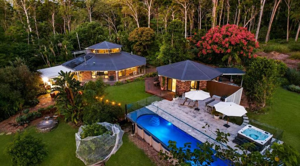 an aerial view of a house with a swimming pool at The Hidden Gem in Tamborine Mountain in Tamborine