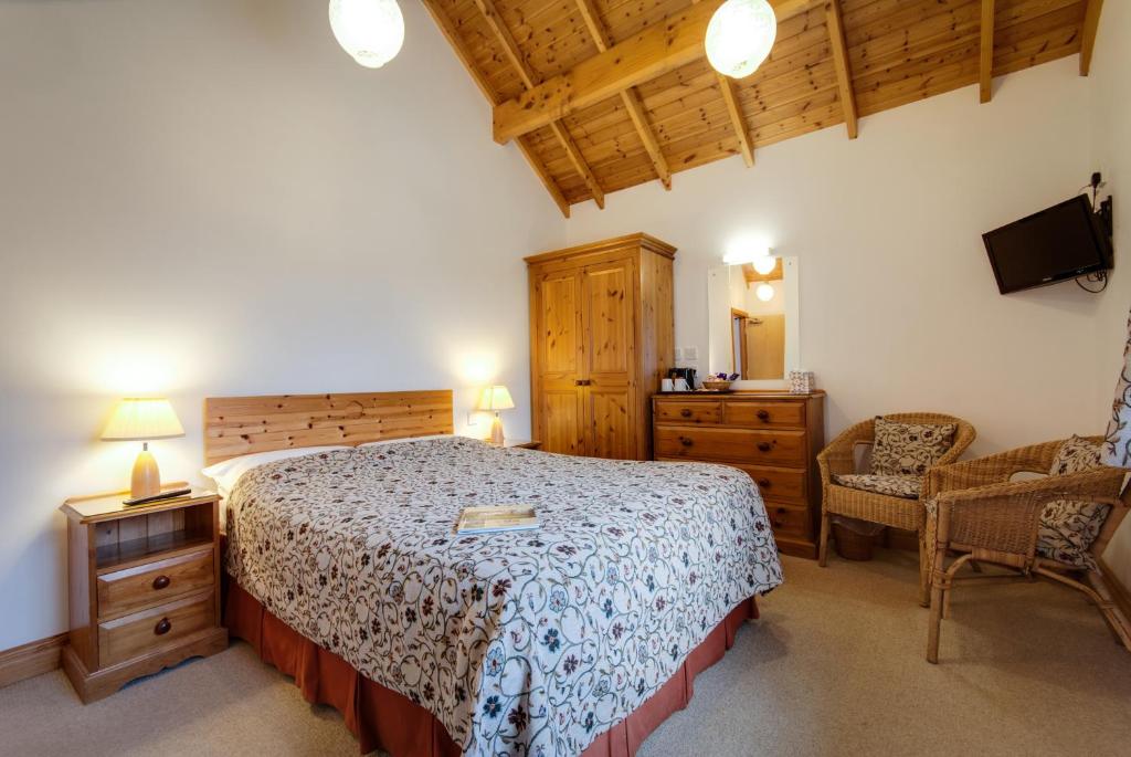 Postel nebo postele na pokoji v ubytování Parr Hall Farm, Eccleston