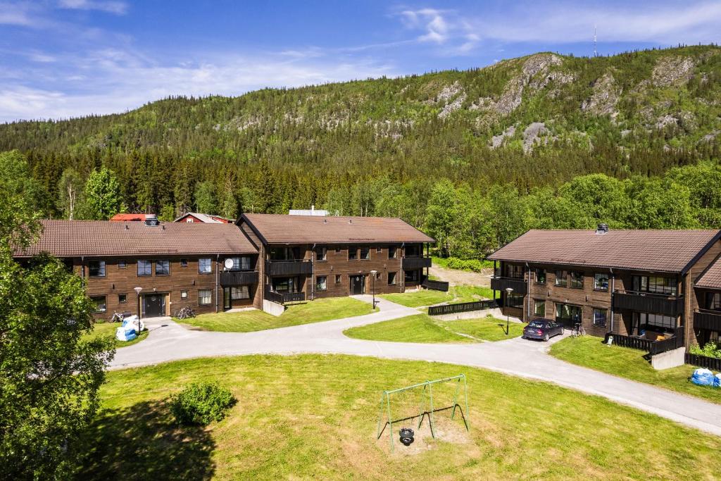 an aerial view of a resort with a playground at Nyhem - Funäsdalen in Funäsdalen