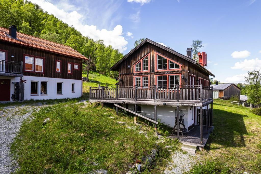 an overhead view of a house with a deck at Blåstöten Osthang - Ramundberget in Bruksvallarna