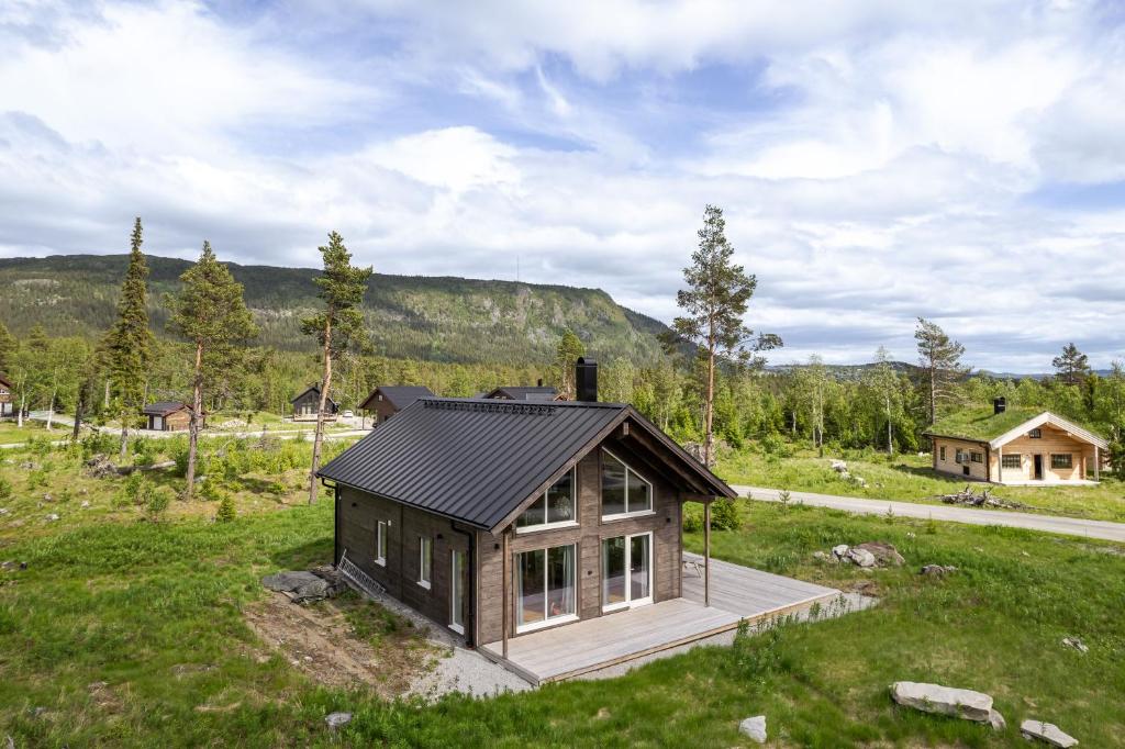 a small house in the middle of a field at Orrmötesvägen 21 - Funäsdalen in Funäsdalen