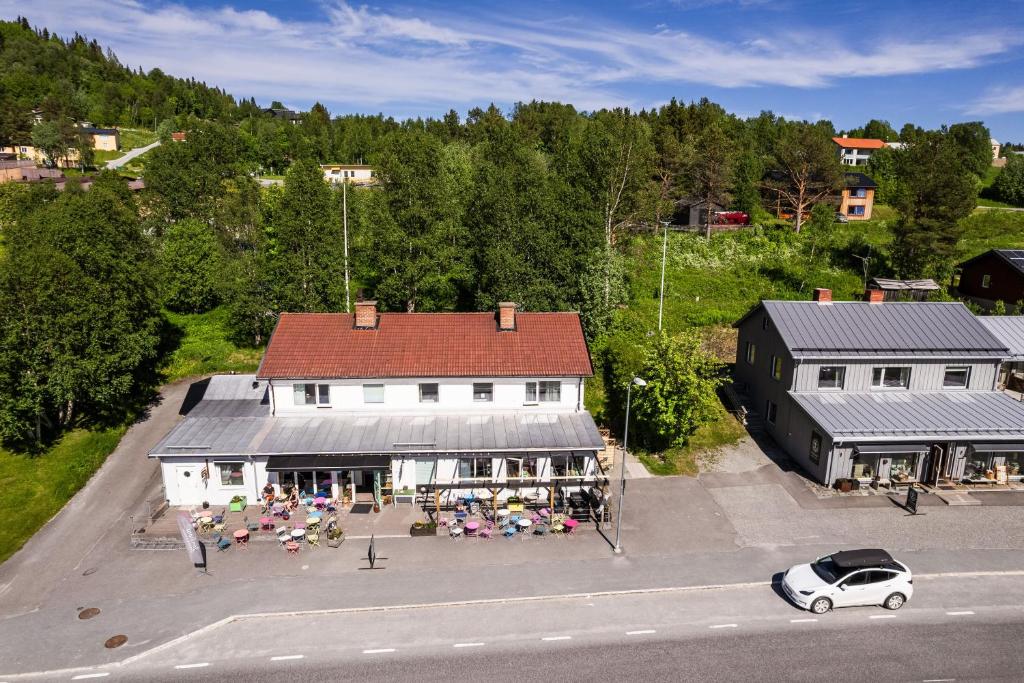 an aerial view of a building with a lot of tables at Vita Villan - Funäsdalen in Funäsdalen