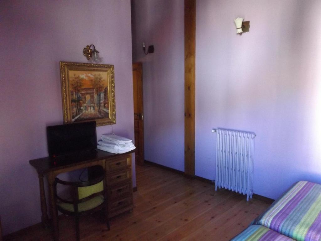 Postel nebo postele na pokoji v ubytování La Fragua de los Alvaro 2