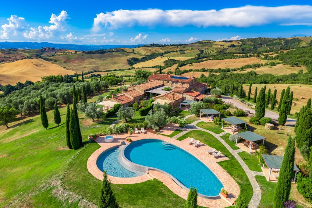 an aerial view of a luxury estate with a swimming pool at Dimora Santa Margherita - Boutique Hotel in Cinigiano
