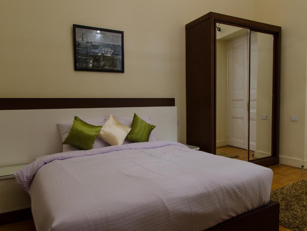 Postel nebo postele na pokoji v ubytování Grand Agor Hotel Cairo