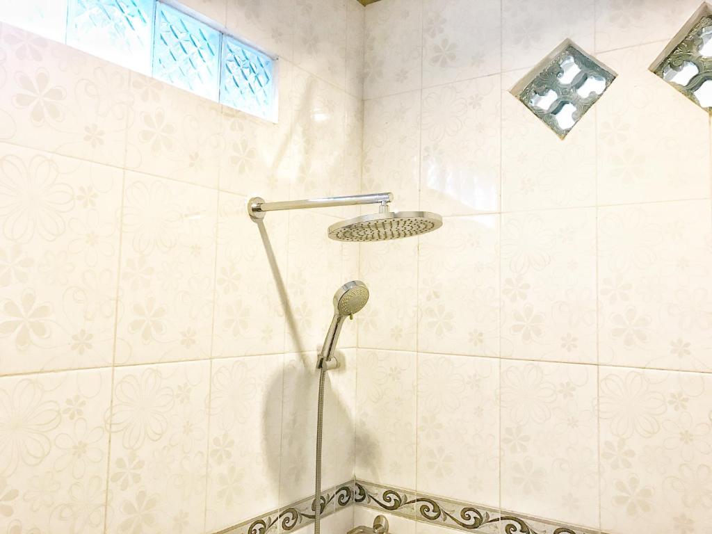 Koupelna v ubytování Sapta House