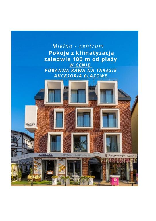 a poster of a building with words on it at Kamienica Mielno in Mielno