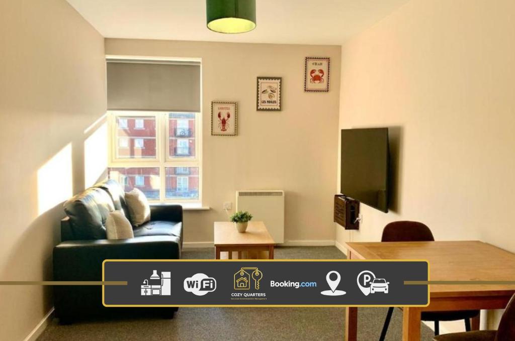 a living room with a couch and a table at 1BR Flat By Cozy Quarters Property Management Short Term Rental Hartlepool Near Marina Views in Hartlepool