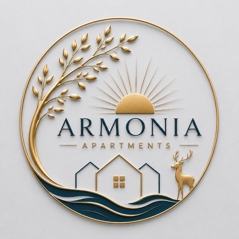 a gold and silver medal with the logo of armoma apartments at Armonia Apartments in Archangelos