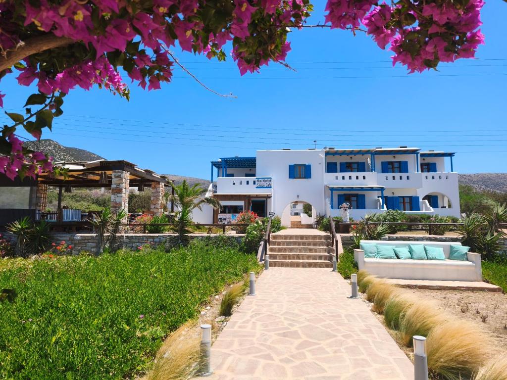 a view of a house from the beach at Ammoudia Studios in Agiassos