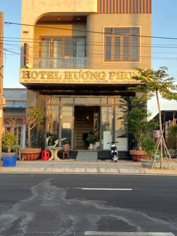 a hotel wronguedrosis sign in front of a building at Hotel Hương Phong in Binh Chau