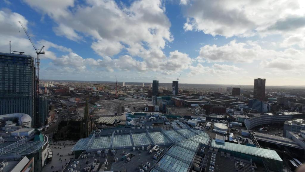 an aerial view of a city with buildings at Nirankaar peace 1bhk in Birmingham