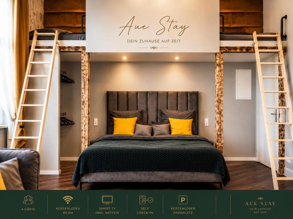 a bedroom with two bunk beds with yellow pillows at Aue Stay in Kassel