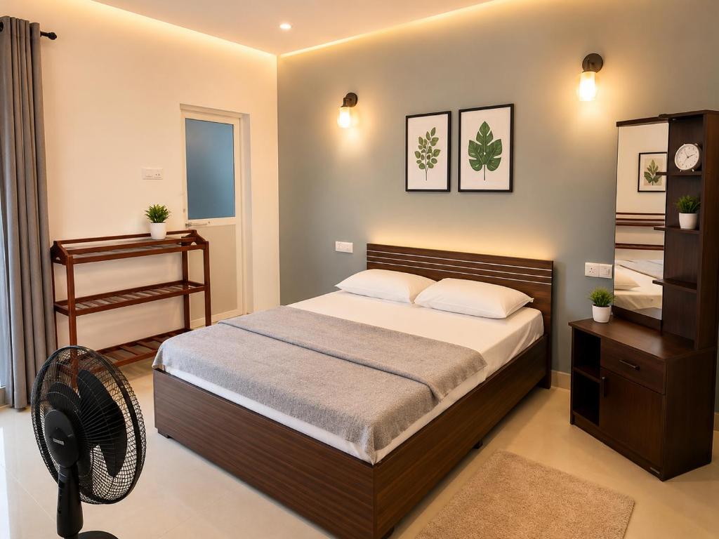 a bedroom with a bed and a chair in it at Eighty seven guest and restaurant in Badulla