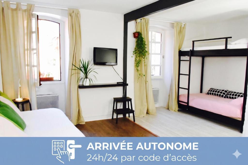 a bedroom with a bunk bed and a tv at Barcelo Appart'hotel in Barcelonnette