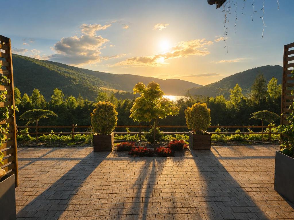 a view of the mountains from a patio at Chaty na Cholewicy Domki Całoroczne in Solina