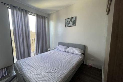 a small bedroom with a bed with a window at house luxury vip in Balayan