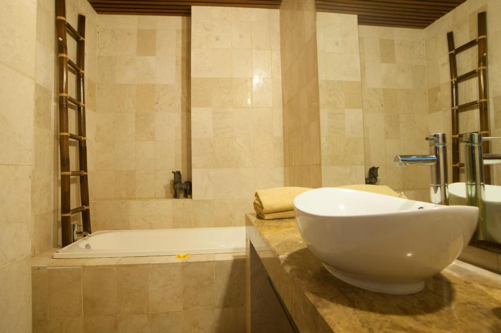 Koupelna v ubytování Bali Mystique Hotel & Apartment