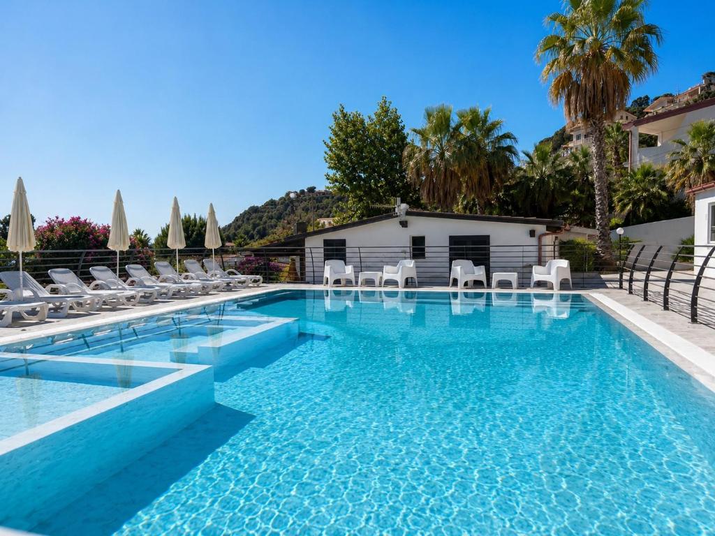 Ninfa Sul Mare Apartments - Piscina con Area Relax e Parcheggio Gratuito