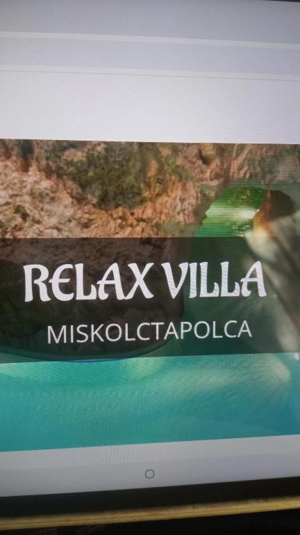 a computer screen with the rabax villa insignia on it at RELAXViLLA MISKOLCTAPOLCA in Miskolc