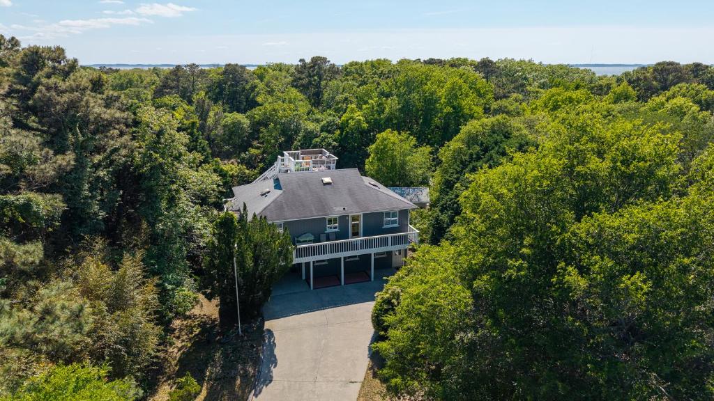 an aerial view of a house in the woods at 3021 - Southern Snores in Kitty Hawk Beach