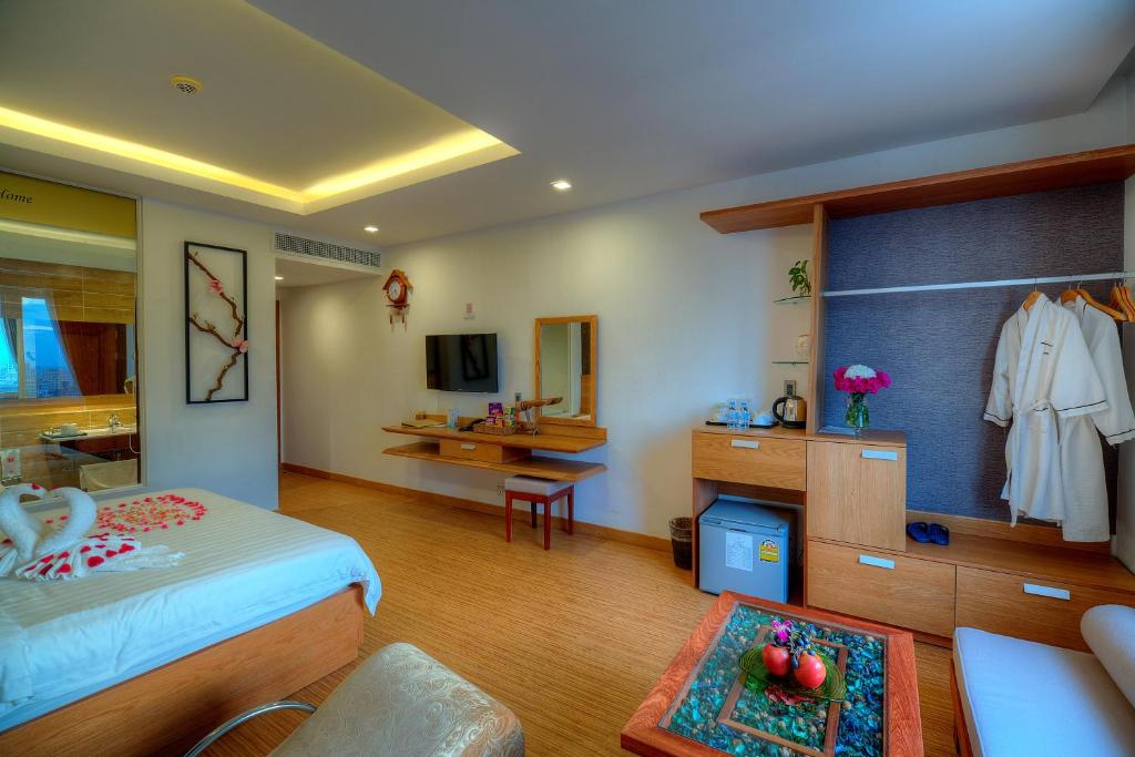 TV a/nebo společenská místnost v ubytování Orussey One Hotel & Apartment