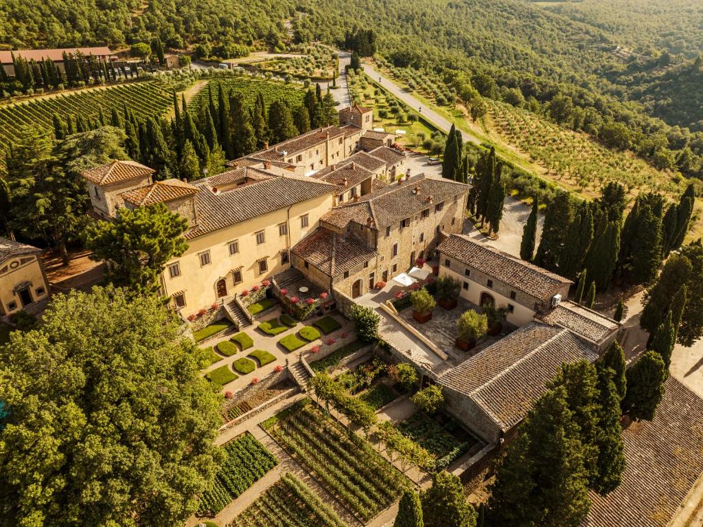 an aerial view of a villa in a vineyard at Castello di Albola in Radda in Chianti