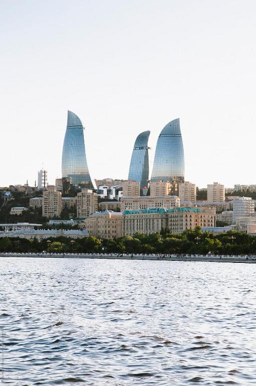 a view of a city from the water at Em capsule Hostel Baku in Baku