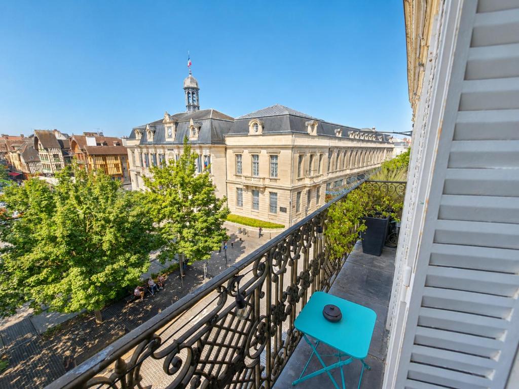 a view of a building from a balcony at Le cœur de Troyes - Appartement & Studio in Troyes