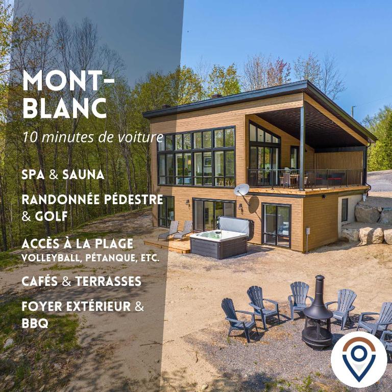 a house with a sign in front of it at Chalet du Golf avec Spa in Saint-Faustin