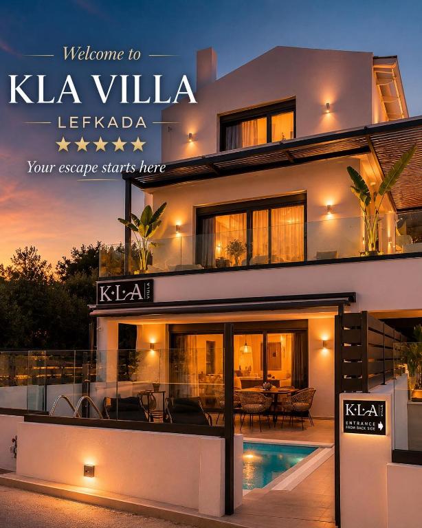 a villa with a swimming pool at night at KLA Luxury Boutique Villa with Pool & Jacuzzi by WESTBOOKING GR in Nikiana