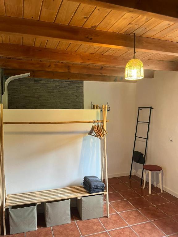 a room with a bunk bed and a ladder at Casa Goyo in Viego