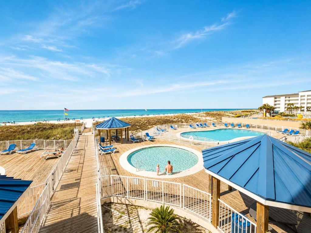 a view of a pool and the beach at Sugar Beach153- 4 pools beachfront in Gulf Shores