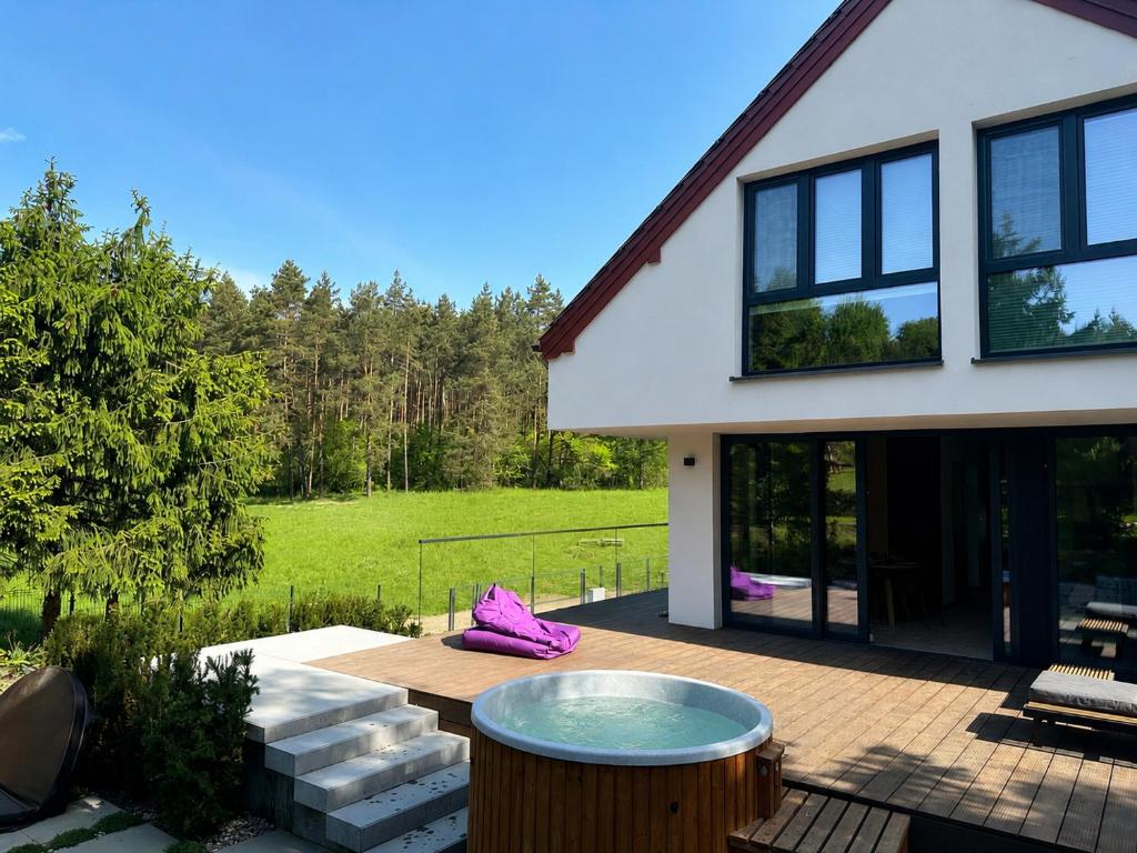 a house with a pool in the backyard at DARESTATE - dom rodzinny in Zgon