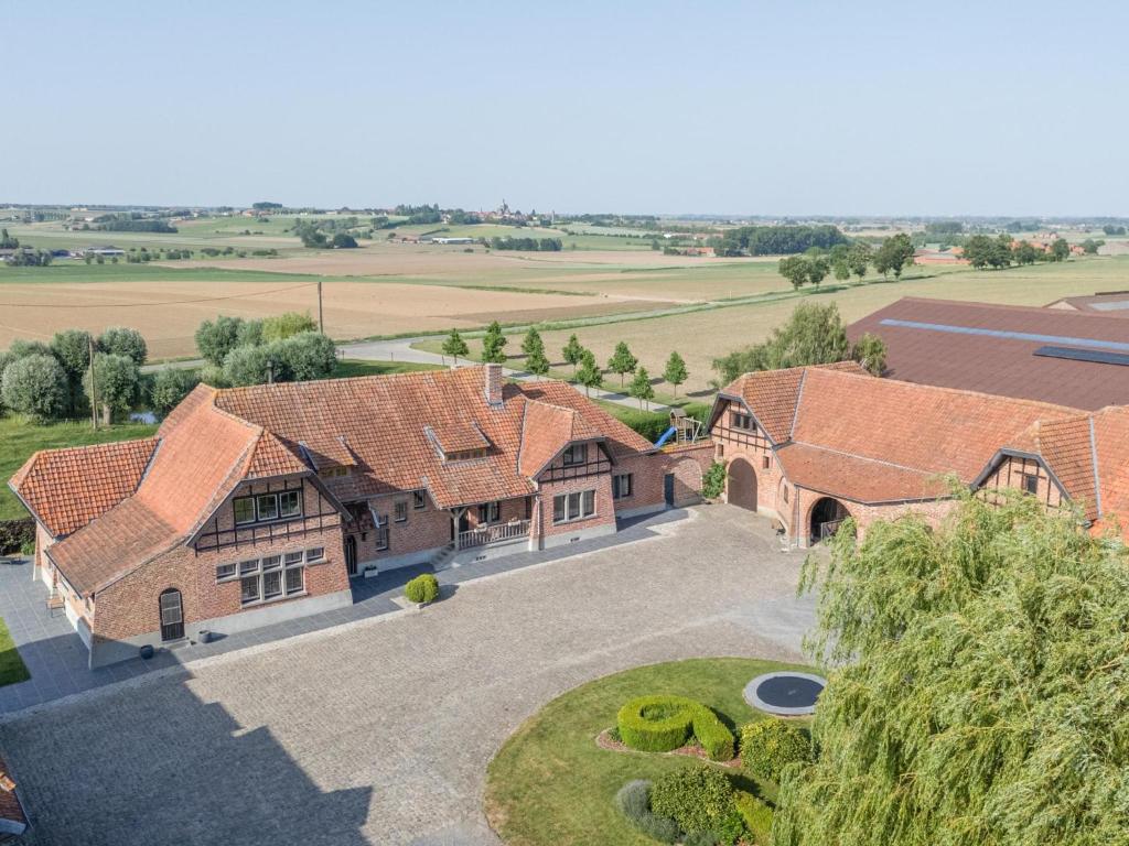 an aerial view of a house with red roofs at Rozenberghoeve in Ploegsteert