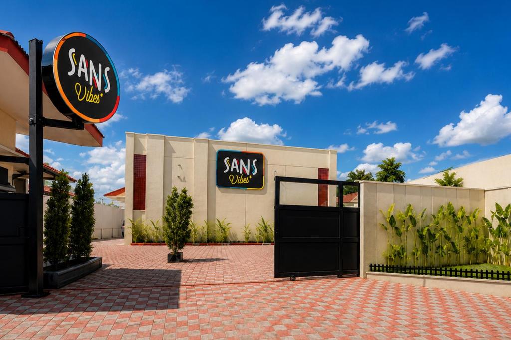 a building with a santa claus sign on it at SANS Vibes Grand Surya Jember Mini Zoo in Panti