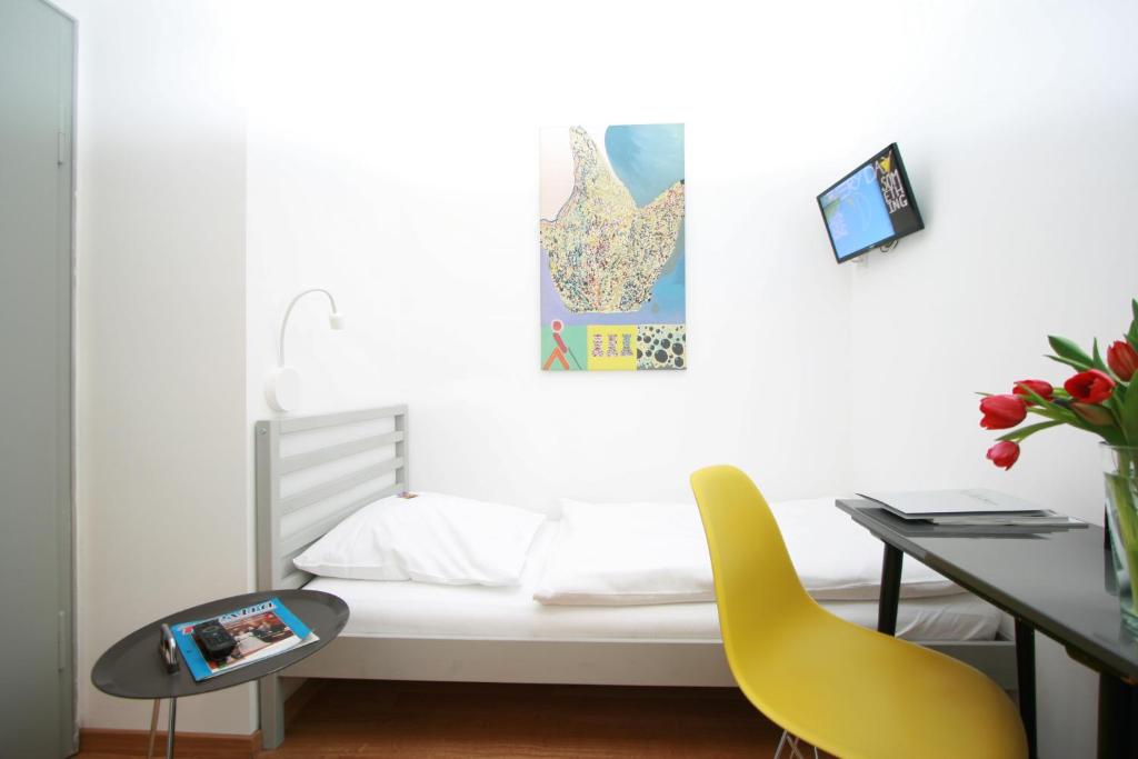 TV a/nebo společenská místnost v ubytování Chelsea Hotel