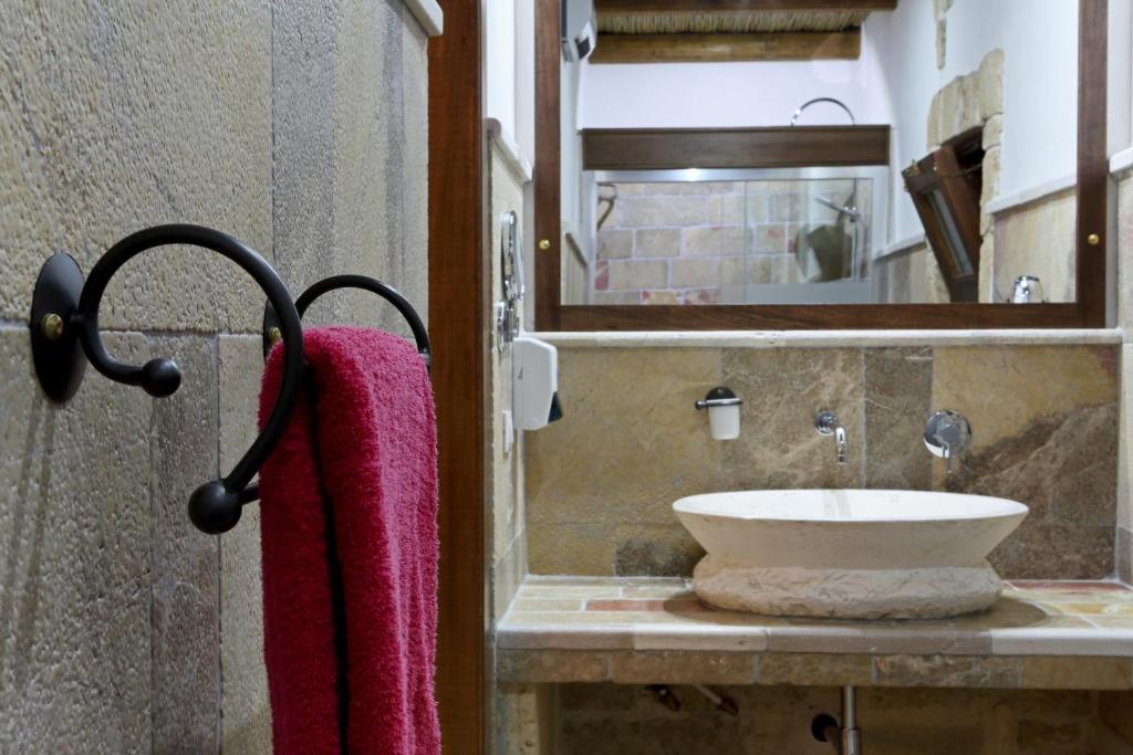 Koupelna v ubytování Masseria L'Uliveto Agri Resort