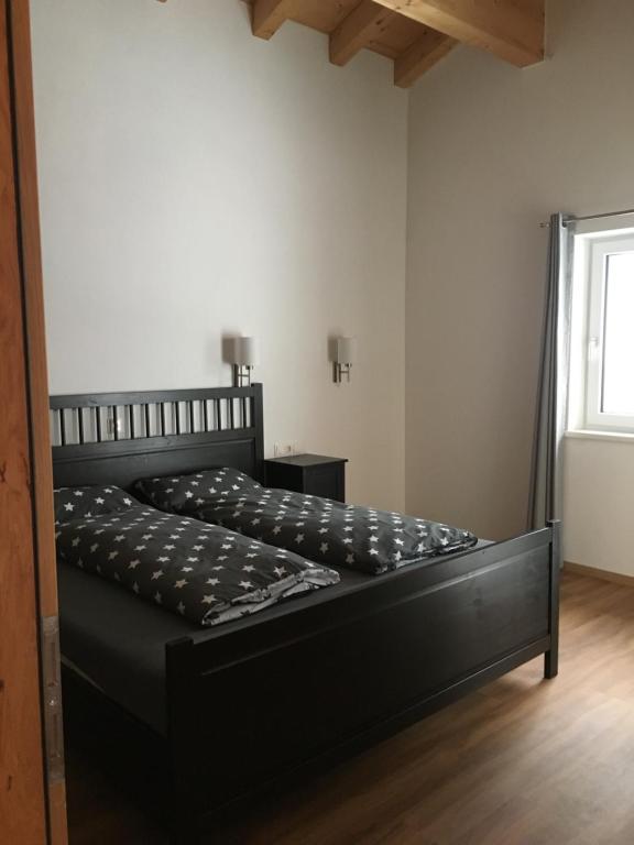 Postel nebo postele na pokoji v ubytování Appartement Mühlhäusl