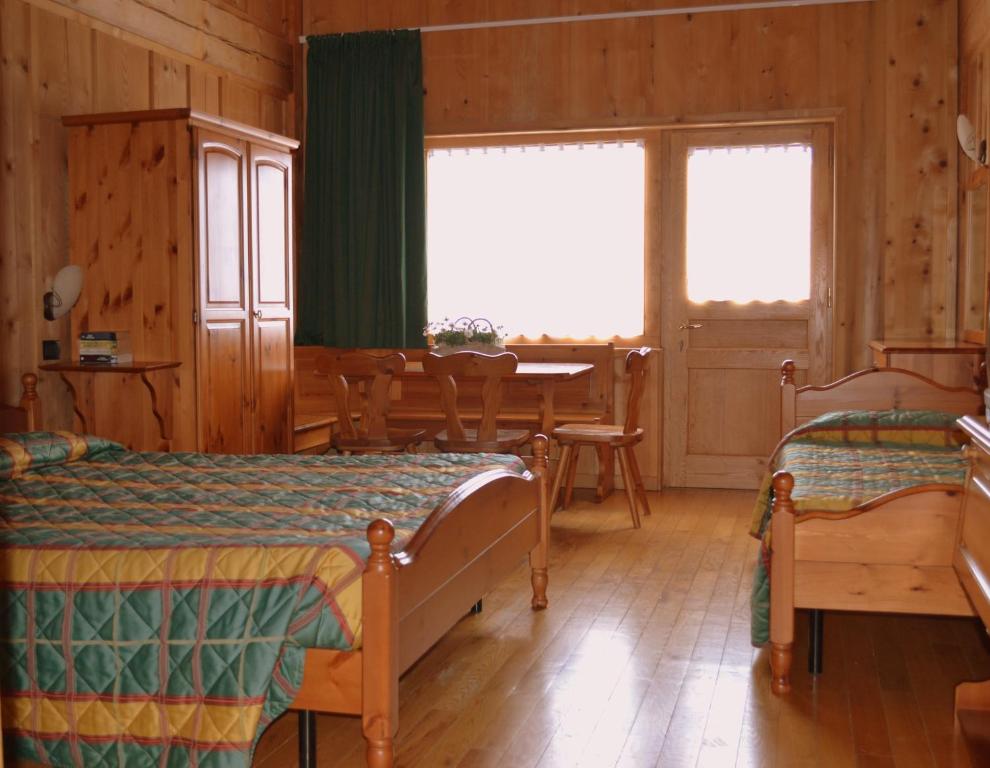Postel nebo postele na pokoji v ubytování Albergo Rendola