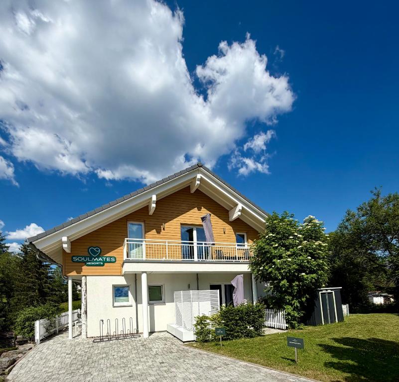 a house on a hill with a blue sky at Soulmates Resorts - Feldberg in Feldberg
