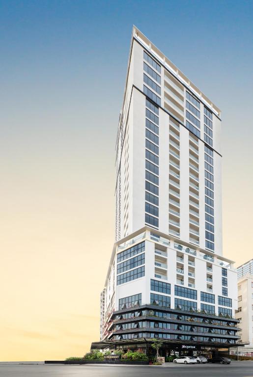 a rendering of a tall white building at H Resident in Phnom Penh