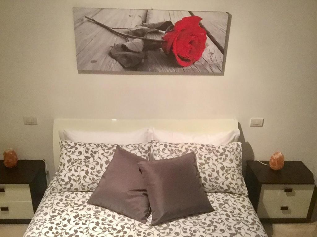 Cama o camas de una habitación en Appartamento I Girasoli