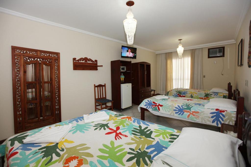 Cama o camas de una habitación en Hotel Kima